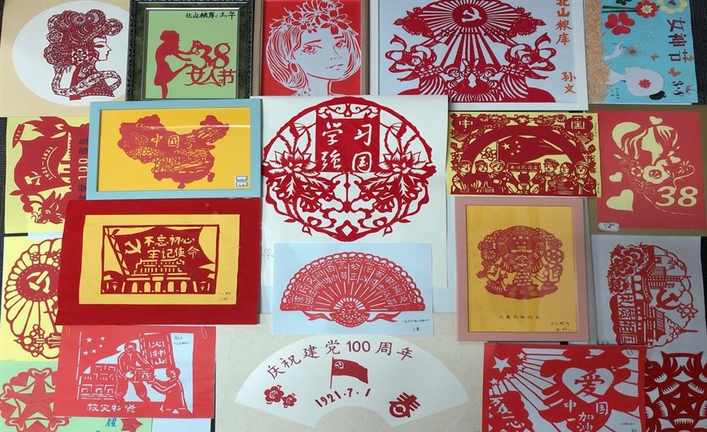 “揭示巾帼风度·通报爱国情义”园区团体展开庆“三八”剪纸勾当